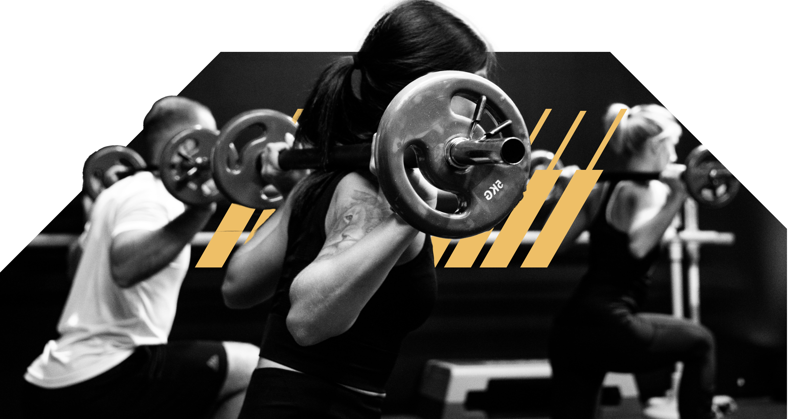 Three people performing a barbell squat.