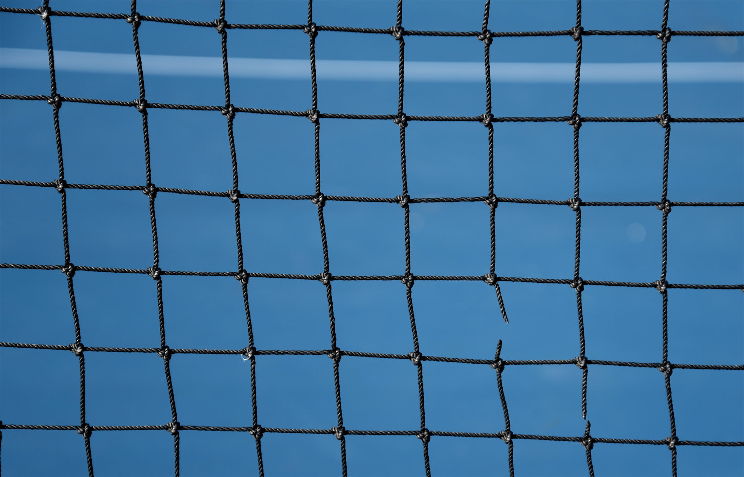 Macro shot of net or goal.