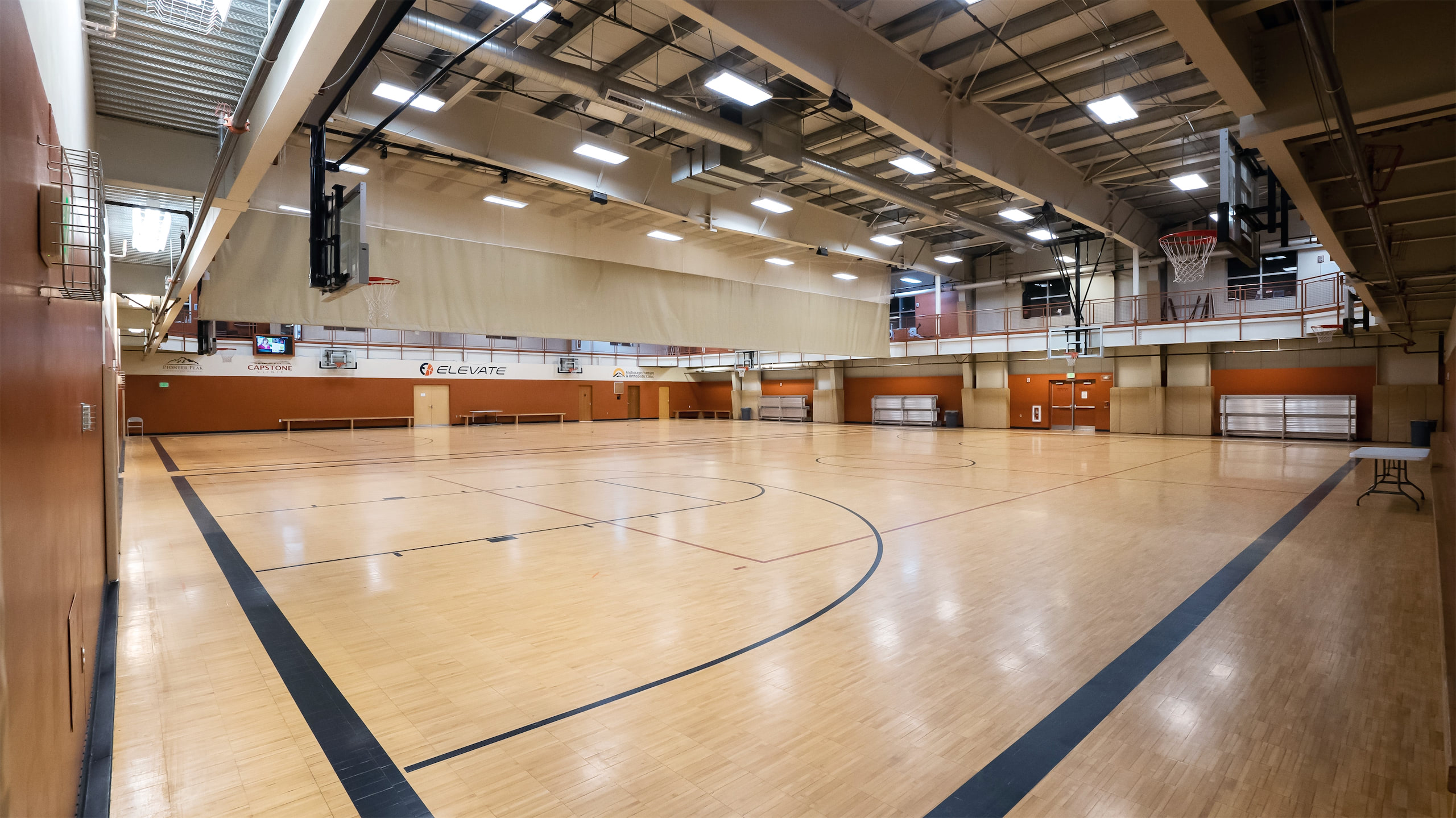 A wide shot of the basketball courts