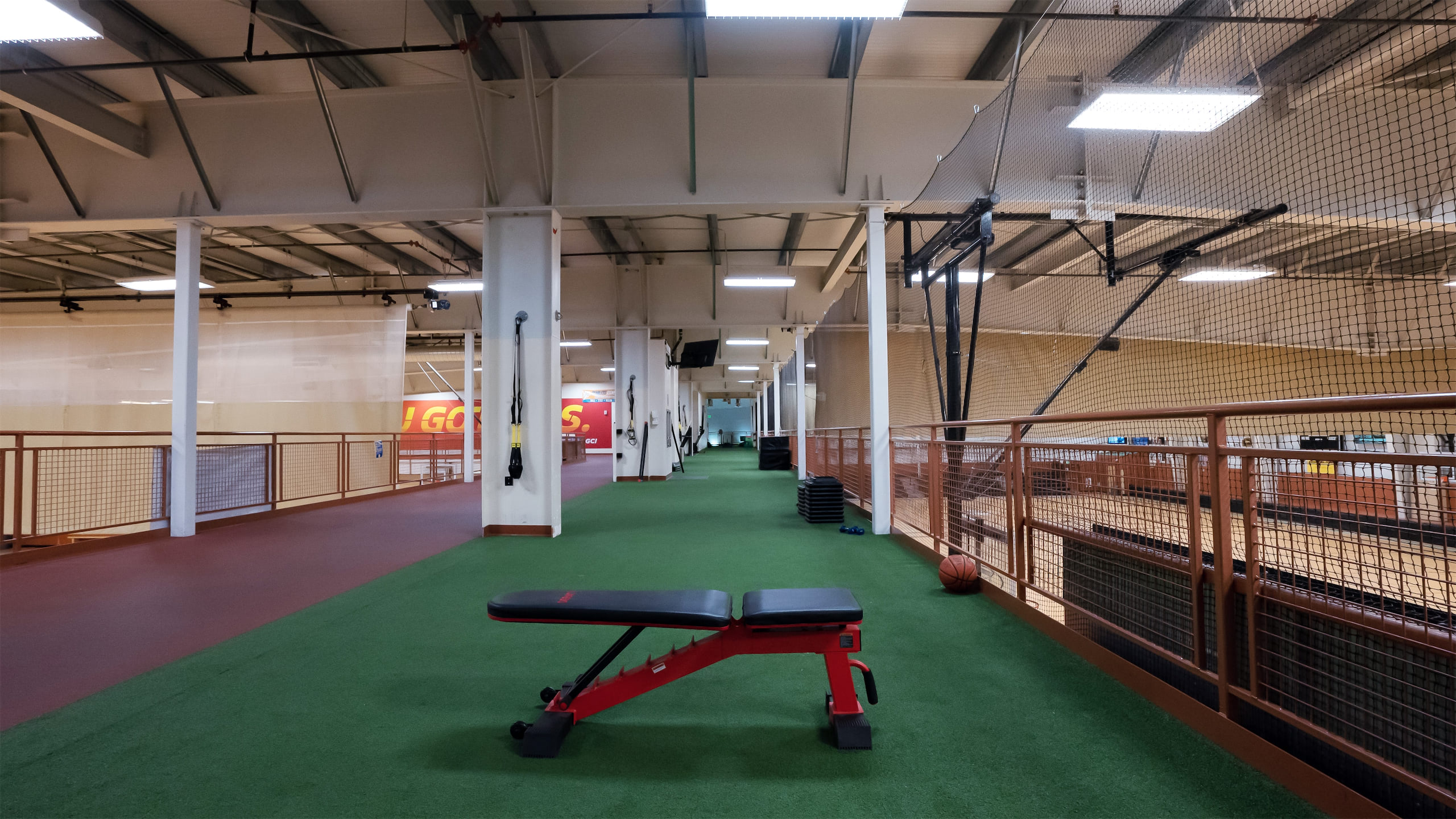 The turf workout area next to the running track.