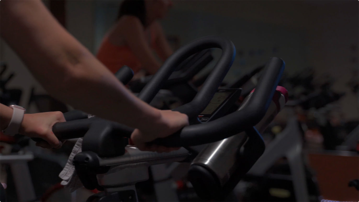 A macro-shot of a guests hands, using the elliptical.